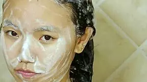 Sexy asian teen enjoys a refreshing shower session