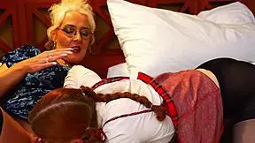 After school, a rough milf teacher dominates a young student with licking and pussy play until orgasm.