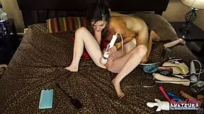 HORNY BRUNETTE JAMIE LITTON RUBS BLONDE CUTIE PIPERS PUSSY WITH A SEX TOY