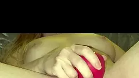 Cute blonde relaxes after bath in homemade close-up