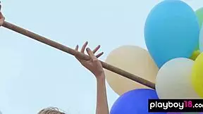 skinny italian milf plays with balloons on the beach 😊