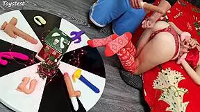 in this double penetration scene at christmas, two thrusting dildos destroy her tight pussy