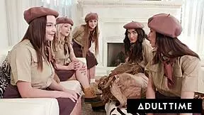 teen girl scouts participate in a group activity with an older man