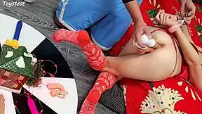 in this double penetration scene at christmas, two thrusting dildos destroy her tight pussy