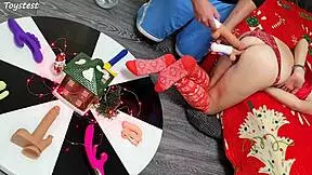 in this double penetration scene at christmas, two thrusting dildos destroy her tight pussy