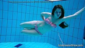 Young Girl Shows Magnificent Body Underwater In Pool