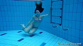 Young Girl Shows Magnificent Body Underwater In Pool