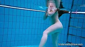 Young Girl Shows Magnificent Body Underwater In Pool