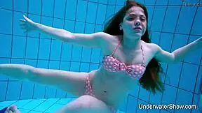 Young Girl Shows Magnificent Body Underwater In Pool