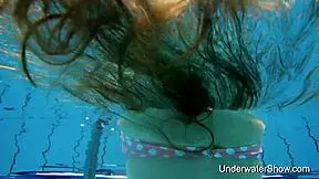 Young Girl Shows Magnificent Body Underwater In Pool