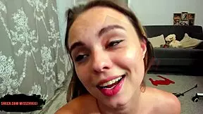 this cute teen gets turned on in red pantyhose, anally playing with her ass on webcam