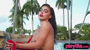big ass stunning beauty strips to flaunt naked figure in the pool, teasing outdoors.