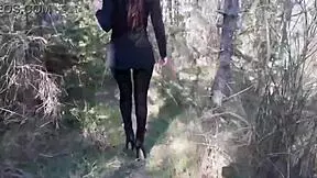 Milf confidently walks in pantyhose and high heels