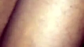 Big ass bounces on young lad's lap outdoors.