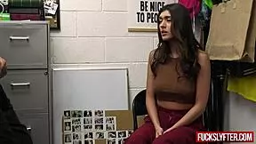 A sweet girl browses musical instruments until she notices a flute has disappeared