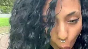 drinking cum in a busy buenos aires park during daylight