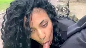 drinking cum in a busy buenos aires park during daylight