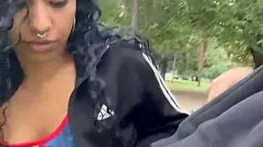 drinking cum in a busy buenos aires park during daylight