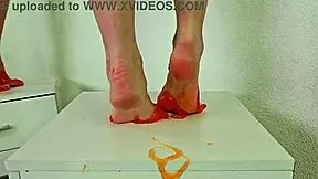 Pretty blonde Alice Klay teases with orange slime on bare feet!