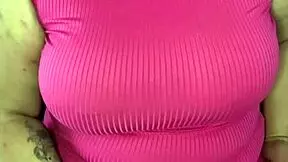 Young Latina girl masturbates on the sofa, touching her big clit and natural tits while using a buttplug