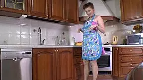 Brunette Sucks On A Lollipop In High Heels?