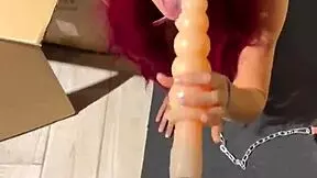 Cat Red fetish girl aroused by blowjob on sex machine.