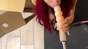Cat Red fetish girl aroused by blowjob on sex machine.