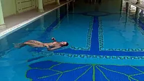 Hungarian Naked Sazan Cheharda Swims Teasingly In Pool!
