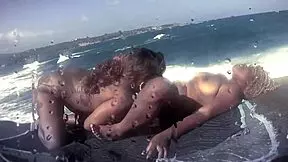 Pornstars Nina Rivera and Porsha Carrera indulge in hot lesbian beach sex with wet licking