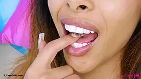 This brunette fashion muse shows her sexy body on the sofa.