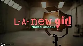 This brunette fashion muse shows her sexy body on the sofa.