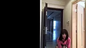 Watch this Asian ladyboy masturbate her dick, flash it to the woman, and cum hard.