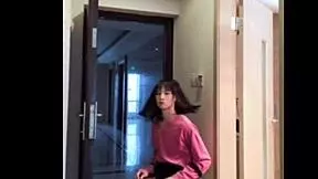 Watch this Asian ladyboy masturbate her dick, flash it to the woman, and cum hard.