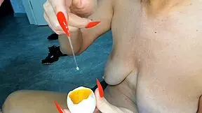 milf demonstrates closeup pussy insemination with handjob