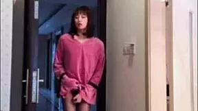 Watch this Asian ladyboy masturbate her dick, flash it to the woman, and cum hard.
