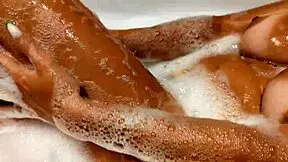 tanned big tits stepsister in bathroom playing with pussy and tits