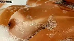 tanned big tits stepsister in bathroom playing with pussy and tits