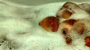 tanned big tits stepsister in bathroom playing with pussy and tits