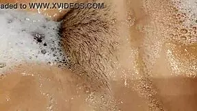 tanned big tits stepsister in bathroom playing with pussy and tits