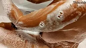 tanned big tits stepsister in bathroom playing with pussy and tits