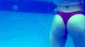 Ashley Rose spreads wet pussy by the pool.