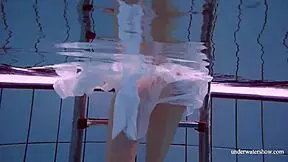 Redhead Marketa Wears A White Dress In The Pool