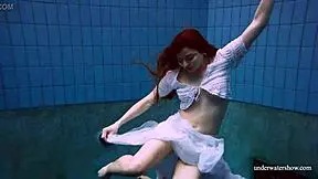 Redhead Marketa Wears A White Dress In The Pool