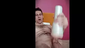 A pretty boy uses a toy to achieve orgasm in his dorm room