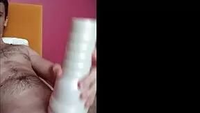 A pretty boy uses a toy to achieve orgasm in his dorm room