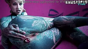 tattoo girl stretches her asshole with solo anal fisting and toys