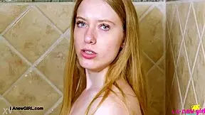 Bright-Eyed Blonde Takes Refreshing Shower Bath