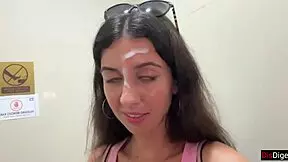 Is that cum on her face in the supermarket? Watch the outdoor blowjob tease unfold