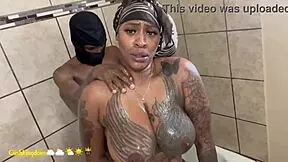 sexy thick cuban shows off her tattoos then gets fucked in the shower doggy style