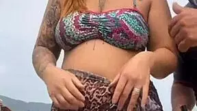 young african girl gets naked on beach and teases guy